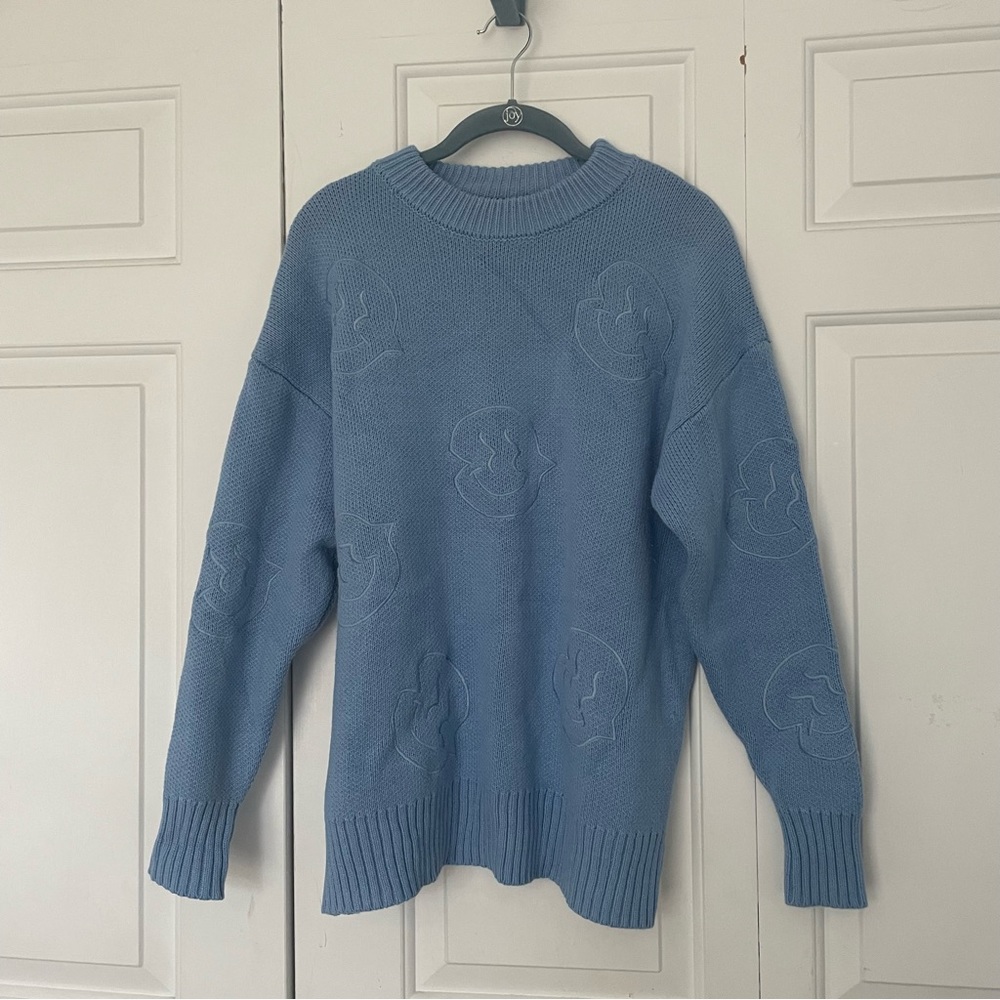 smiley face oversized sweater